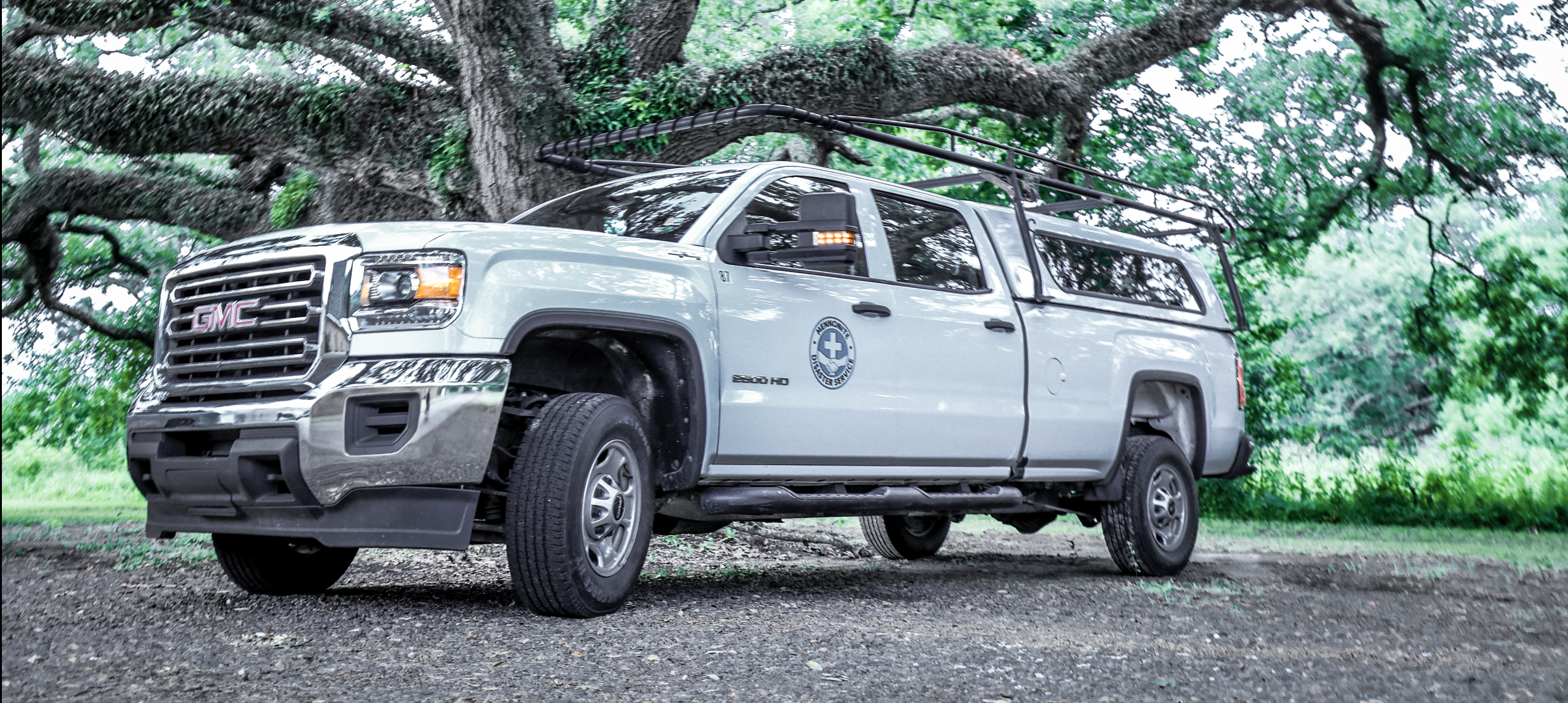 An MDS truck sits under a majestic tree at the Jennings, LA base camp. 